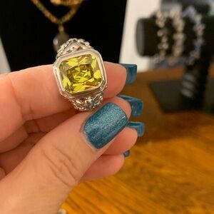 Luminous Yellow Stone in a Silver Tone Ring